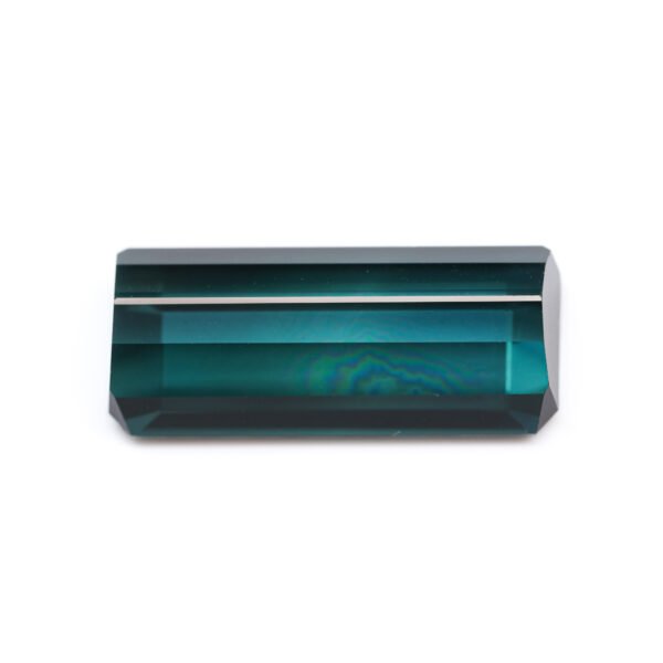Flawless 23mm long blue indicolite tourmaline gemstone from Mozambique for custom high-end jewelry.