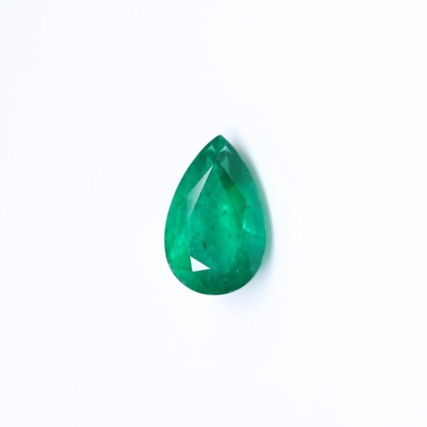 7.40 carat natural Zambian emerald, vivid green color, pear cut, minor oil treatment.
